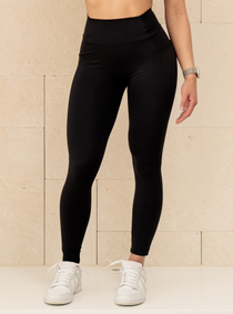 Phantom Pocket Legging in Carbon, black leggings with side pockets, front view on a model