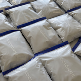 Pile of packed Lociónne mystery bags